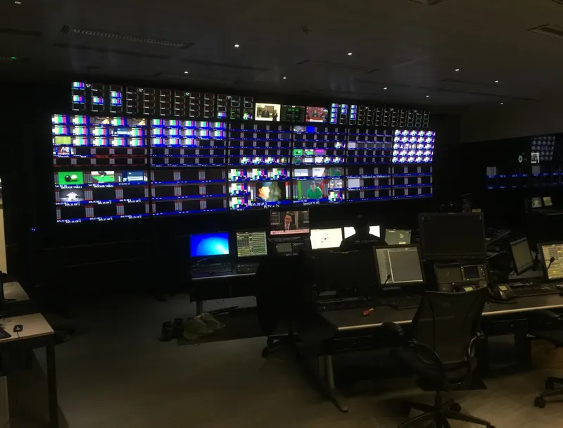 IMG's master control room at Stockley Park, with a large multiviewer monitor wall above operator workstations.