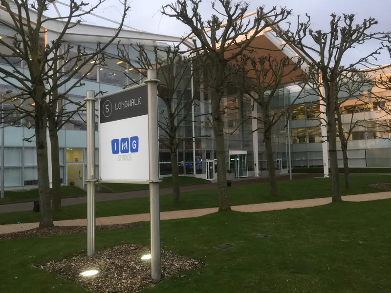 The IMG Studios sign outside 5 Longwalk, IMG's glass-fronted building at Stockley Park.